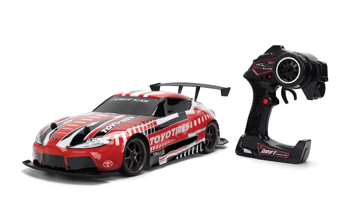 Red Jada Pink Slips Toyota GR Supra RC car with pistol-grip remote